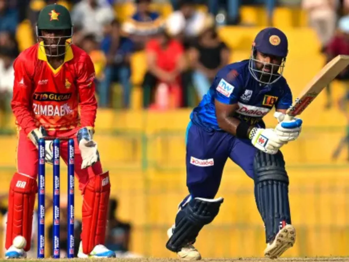 Zimbabwe vs Sri Lanka cricket match action with batsman and wicketkeeper showcasing thrilling battle on the field.