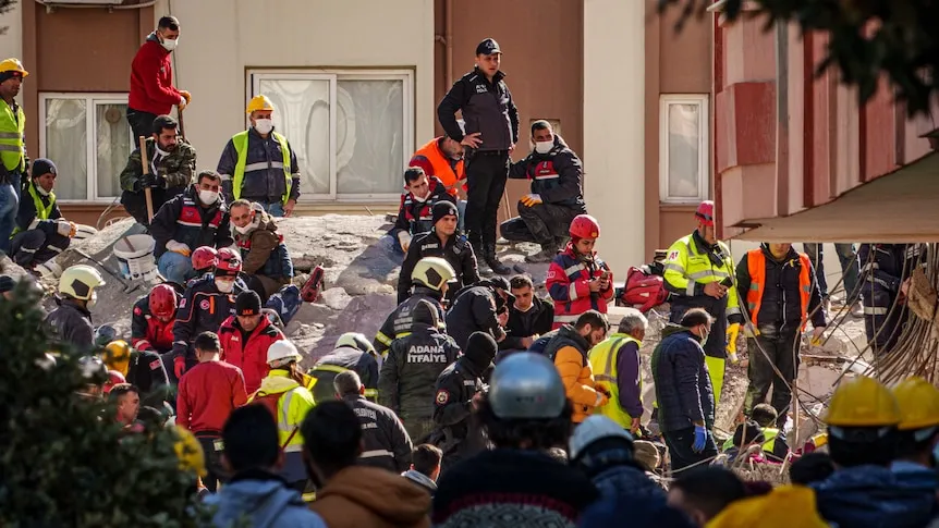 Losses and Injuries in Earthquake Today – emergency responders search collapsed buildings amid rubble for survivors.