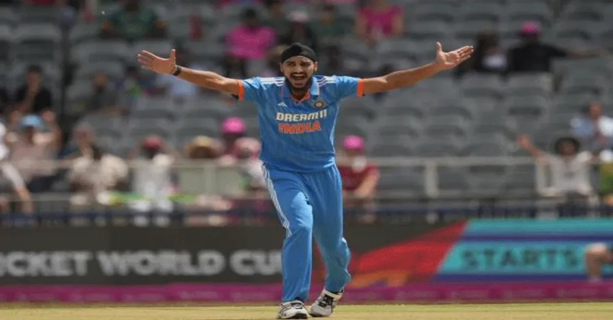 Arshdeep Becomes First India Bowler to Reach 100 T20I Wickets celebrating milestone in cricket match.