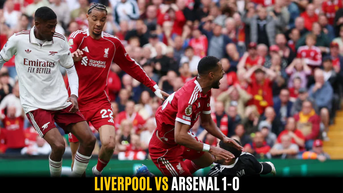 Liverpool vs Arsenal 1-0 action photo showing intense Premier League clash with players battling on the field.
